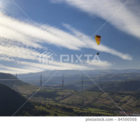 Multi-span cable stayed Millau Viaduct across gorge valley of Tarn River, Aveyron Departement, France Multi-span cable stayed Millau Viaduct across gorge valley of Tarn River, Aveyron Departement, France 84500508