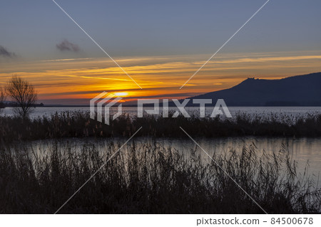 Nove Mlyny reservoir and Palava hills during sunrise in winter, Southern Moravia, Czech Republic Nove Mlyny reservoir and Palava hills during sunrise in winter, Southern Moravia, Czech Republic 84500678