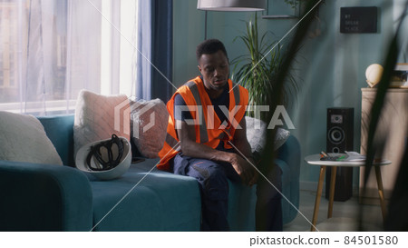 Depressed black worker walking to work 84501580