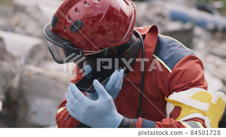 African American paramedic sending voice message 84501728
