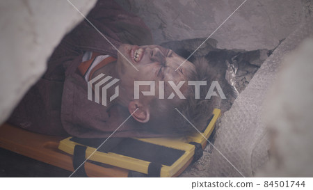 Injured teenager screaming for help 84501744