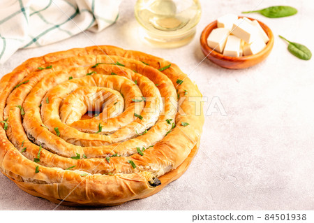 Spanakopita, greek phyllo pastry pie Spanakopita, greek phyllo pastry pie 84501938