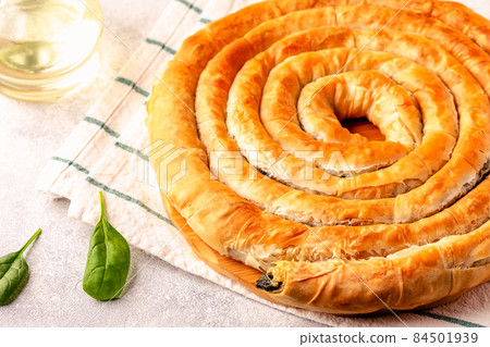 Spanakopita, greek phyllo pastry pie Spanakopita, greek phyllo pastry pie 84501939