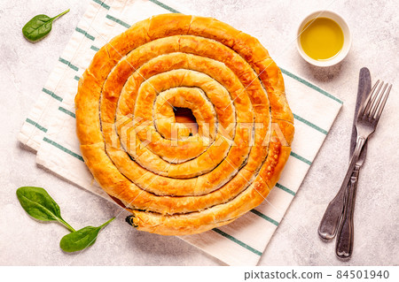Spanakopita, greek phyllo pastry pie Spanakopita, greek phyllo pastry pie 84501940