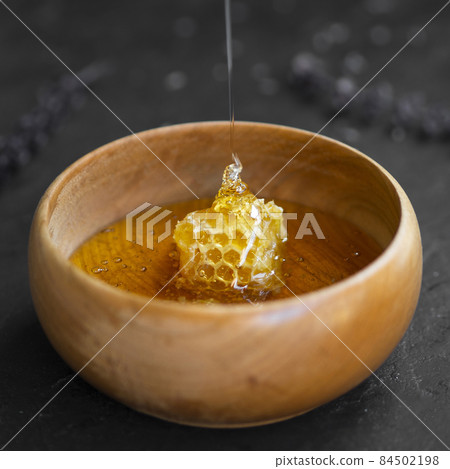 delicious honeycomb wooden bowl. High quality photo delicious honeycomb wooden bowl. High quality photo 84502198