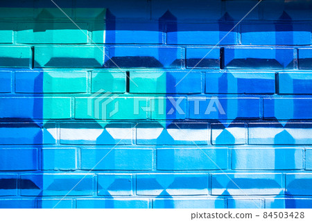 colorful pattern on a brick wall. background 84503428