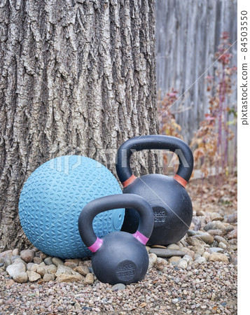 kettlebells and slam ball - backyard fitness 84503550