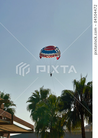 Parachute over the sea, a resort water activities Parachute over the sea, a resort water activities 84504472