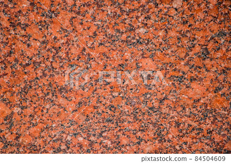 Background from an orange granite slab close up 84504609