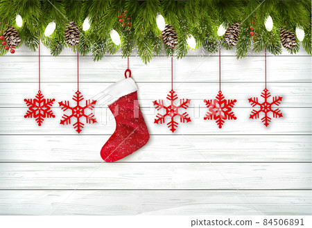 Holiday Christmas background with branch of tree, christmas snowflakes and a red socket. Vector 84506891