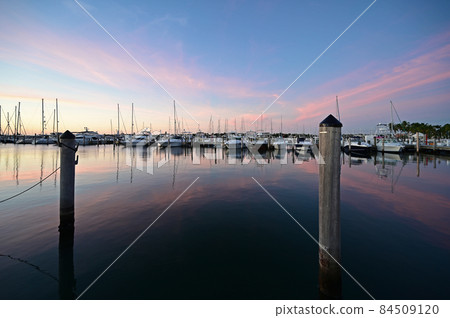 Boats docked in marina in Miami, Florida at sunrise. 84509120