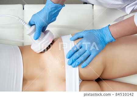 Hardware cosmetology. Body care. Spa treatment. Ultrasound cavitation body contouring treatment 84510142