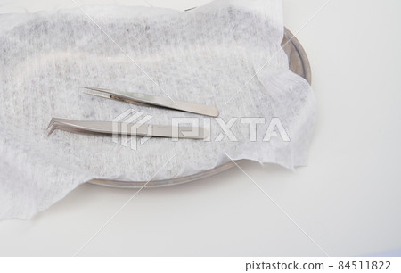 Tools for Eyelash Extension Procedure. Two sterile tweezers 84511822