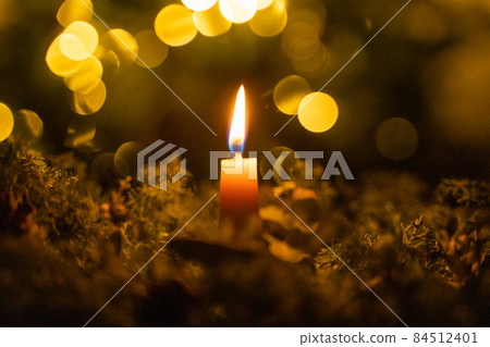 Lighted candles 84512401