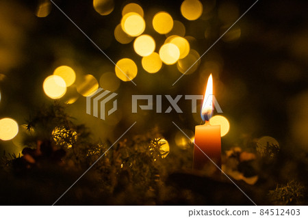Lighted candles Lighted candles 84512403