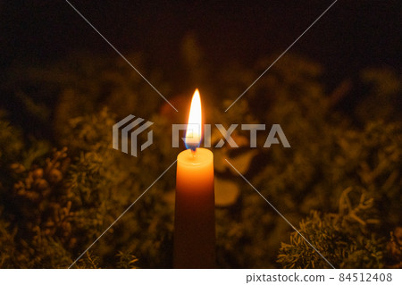 Lighted candles 84512408