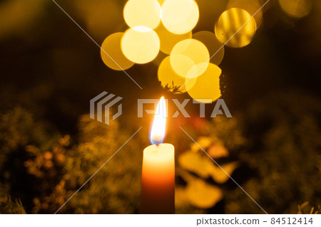 Lighted candles 84512414