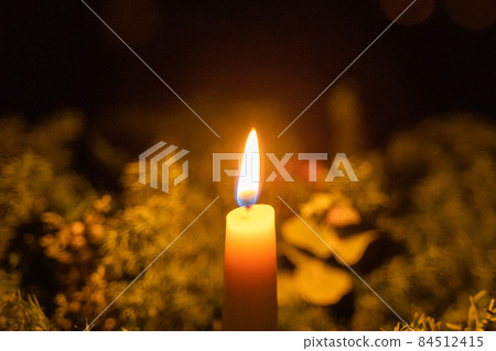 Lighted candles 84512415