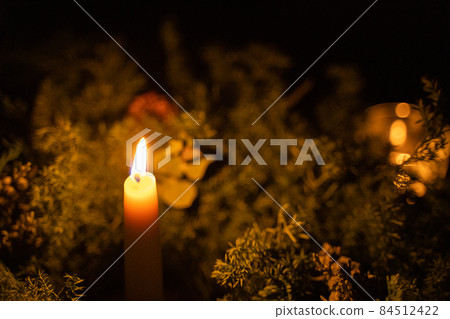 Lighted candles 84512422