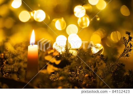 Lighted candles 84512423