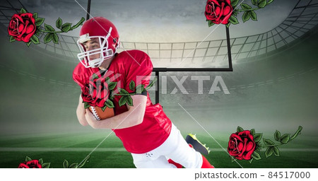 Digital composite image of male american football player catching falling rose against goal post Digital composite image of male american football player catching falling rose against goal post 84517000