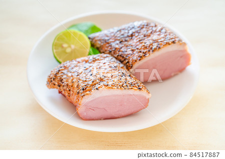 Duck pastrami cut in half Duck pastrami cut in half 84517887