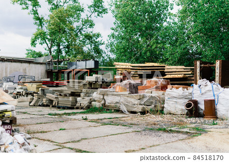 Large sectional sewer pipes, bricks, paves in warehouse construction 84518170