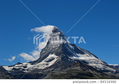 Matterhorn, an independent peak against the backdrop of the blue sky Matterhorn, an independent peak against the backdrop of the blue sky 84518300