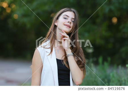 young girl on nature shows emotions 84519876