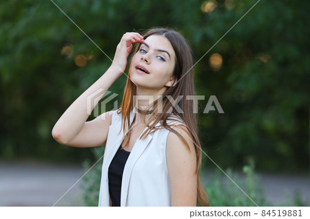 young girl on nature shows emotions 84519881