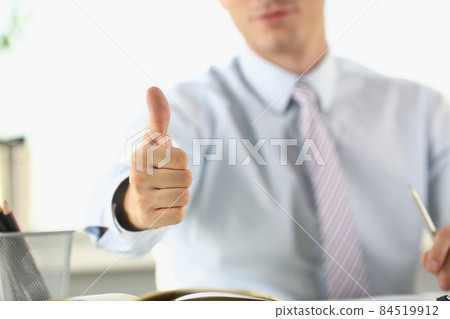 Man in the office shows ok gesture, close-up Man in the office shows ok gesture, close-up 84519912