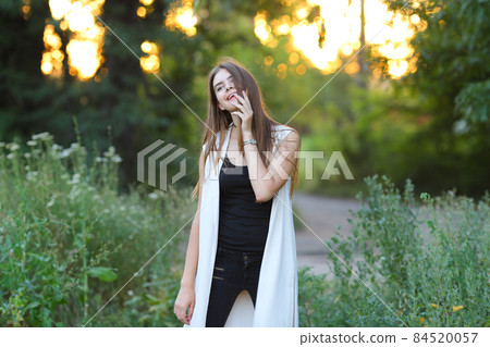 young girl on nature shows emotions 84520057