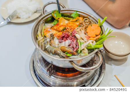Vietnamese soup hot pot with shrimp, pork and sauerkraut Vietnamese soup hot pot with shrimp, pork and sauerkraut 84520491