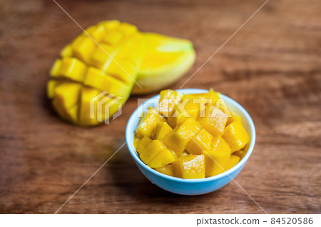 Bowl of healthy fresh mango 84520586