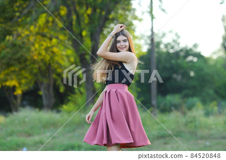 Young beautiful girl shows emotions delight pleasure bliss Young beautiful girl shows emotions delight pleasure bliss 84520848