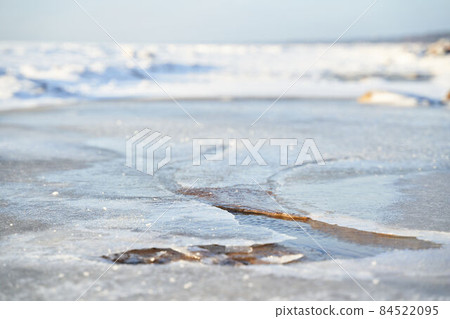 Spring landscape with clear sky and snow cover of ice on reservoir of lake Spring landscape with clear sky and snow cover of ice on reservoir of lake 84522095