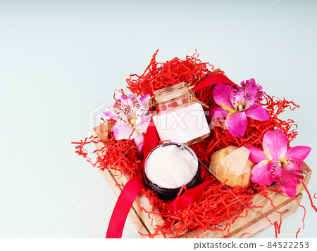 gift box with cosmetics on the theme of Valentine's day, birthday and wedding gift box with cosmetics on the theme of Valentine's day, birthday and wedding 84522253