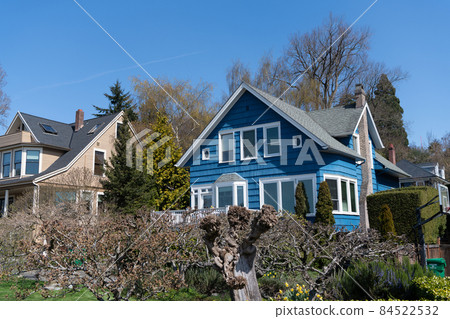 rent a house. insure housing. insurance concept. family cottage. dwelling with trees. 84522532