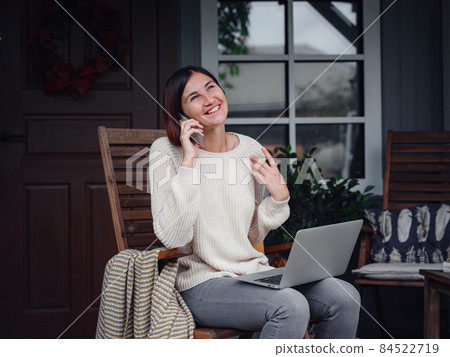 female studying at home with laptop. 84522719