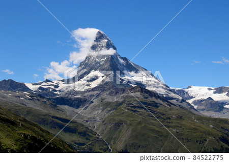 Independent peak Matterhorn against the background of the blue sky Another angle Independent peak Matterhorn against the background of the blue sky Another angle 84522775