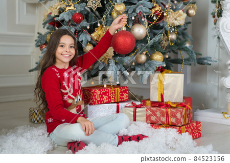 small happy girl at christmas. Christmas. Kid enjoy small happy girl at christmas. Christmas. Kid enjoy 84523156