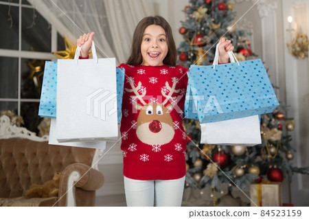 little child girl likes xmas present. Christmas. Kid enjoy little child girl likes xmas present. Christmas. Kid enjoy 84523159