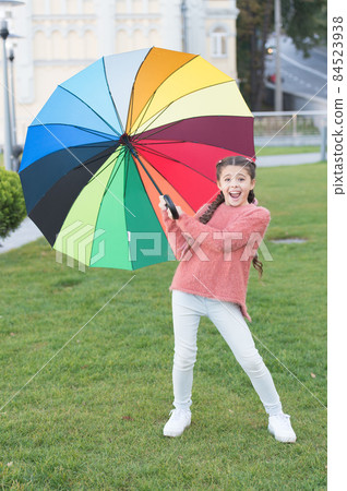 Girl child long hair walking park with umbrella. Girl child long hair walking park with umbrella. 84523938