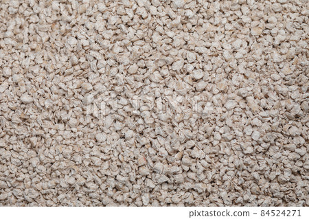 Cat litterbox with natural flushable biodegradable refined active pine wood pellet as clumping litter. Eco-friendly product for indoor pets. Closeup Cat litterbox with natural flushable biodegradable refined active pine wood pellet as clumping litter. Eco-friendly product for indoor pets. Closeup 84524271