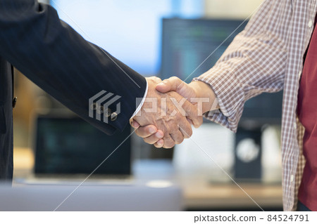 Business scene Handshake suit businessman and young man 84524791