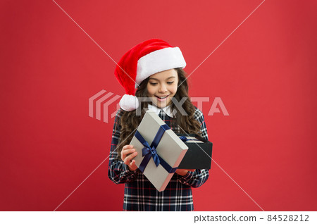 little girl open present box. happy new year gift. time little girl open present box. happy new year gift. time 84528212