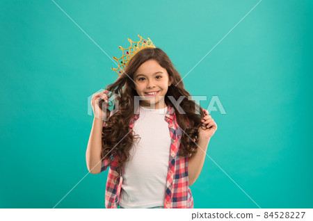 Girl cute baby wear crown while stand blue background. Girl cute baby wear crown while stand blue background. 84528227