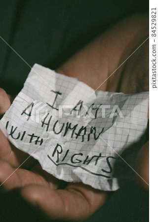 piece of paper that reads I am a human with rights 84529821