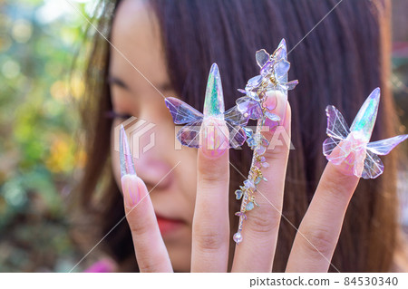 Butterfly nails and models 84530340