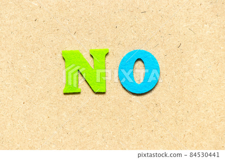 Color cloth alphabet letter in word no on wood background Color cloth alphabet letter in word no on wood background 84530441